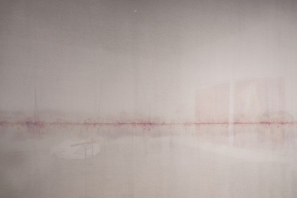Detail of hanging fabric with lavender marks running down the middle, fingerprints revealed with forensic developer.