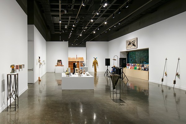 Installation view featuring various sculptures and records throughout the gallery.&nbsp;