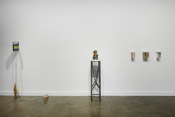 Installation view with three small sculptures against the gallery wall.&nbsp;