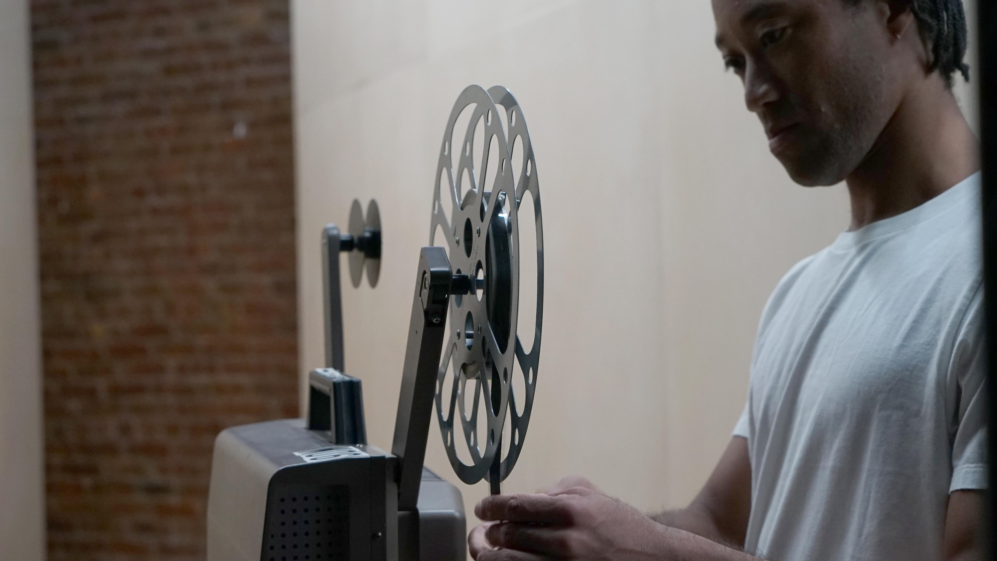 Theresa Hak Kyung Cha, Jimmy Robert, flipping through pages keeping a record of time at Participant Inc, photo 54