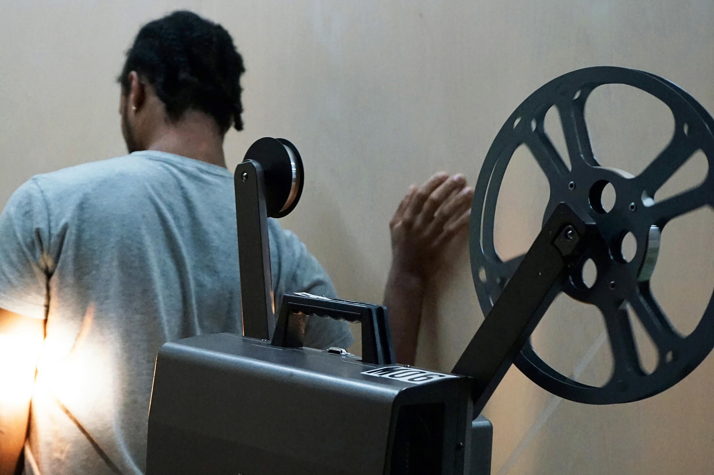 Theresa Hak Kyung Cha, Jimmy Robert, flipping through pages keeping a record of time at Participant Inc, photo 55